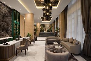 Posezení v ubytování Sutasoma Hotel
