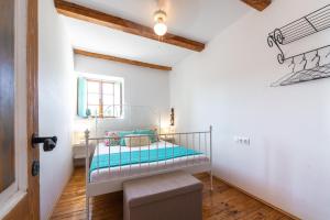 Posteľ alebo postele v izbe v ubytovaní Rustic Stone Villa Begovi Dvori- 15 minutes to Dubrovnik