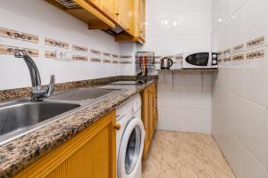 Kuchnia lub aneks kuchenny w obiekcie Caballero Apartment
