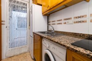 Kuchyň nebo kuchyňský kout v ubytování Caballero Apartment