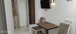 TV a/nebo společenská místnost v ubytování Hotel Heimli + 34 fotografií