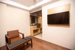 TV a/nebo společenská místnost v ubytování Lee-Benz ARK HOTEL