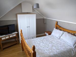 Postel nebo postele na pokoji v ubytování Grove Cottage, Flamborough