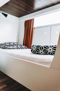 Posteľ alebo postele v izbe v ubytovaní Funk Lounge Hostel