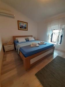 BellaVistaZmukic Guesthouse客房内的一张或多张床位