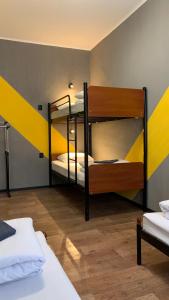 a room with two bunk beds in a room at hostel Koleso in Odesa