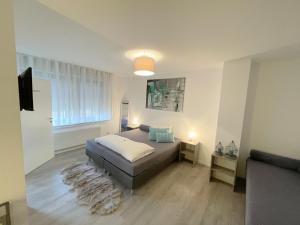 Postel nebo postele na pokoji v ubytování Hotel Hegemann garni