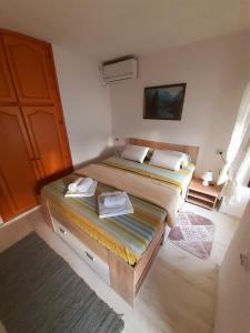 BellaVistaZmukic Guesthouse客房内的一张或多张床位
