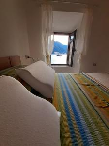 Кровать или кровати в номере BellaVistaZmukic Guesthouse