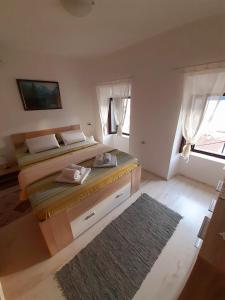 BellaVistaZmukic Guesthouse客房内的一张或多张床位