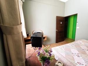 Postel nebo postele na pokoji v ubytování 博愛泊旅讀心境