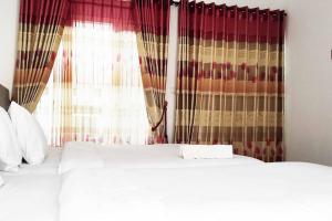 Gallery image of Pertiwi Homestay Near Museum Angkut Batu Mitra RedDoorz in Malang