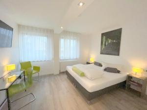Postel nebo postele na pokoji v ubytování Hotel Hegemann garni