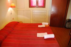 Postel nebo postele na pokoji v ubytování B&B Selve di Rogaro