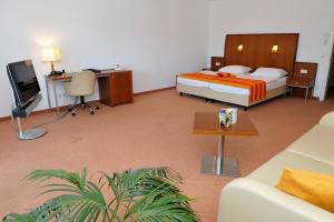 TV in/ali zabaviščno središče v nastanitvi Hotel Plattenwirt