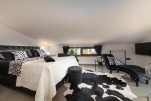 Postel nebo postele na pokoji v ubytování Casa Nera - Luxury & Style