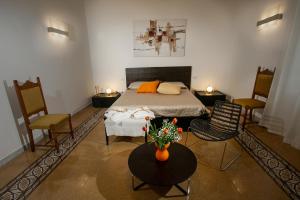 En eller flere senge i et værelse på Abate Luxury Interno 3