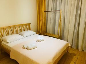 Postel nebo postele na pokoji v ubytování Chalet Kvariati