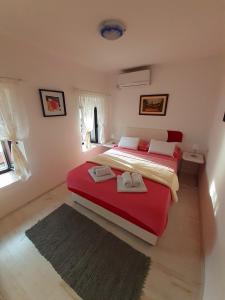 BellaVistaZmukic Guesthouse客房内的一张或多张床位