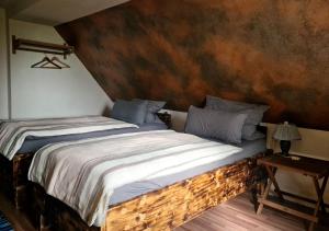 Postel nebo postele na pokoji v ubytování Hotel Geismarburg