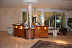 a hair salon with a counter in a room at Hotel-Restaurant Fischer in Bad Waltersdorf