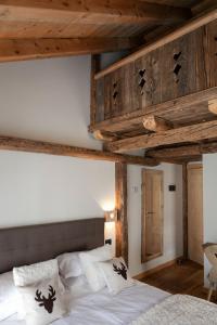 Postel nebo postele na pokoji v ubytování B&B Il Tabià