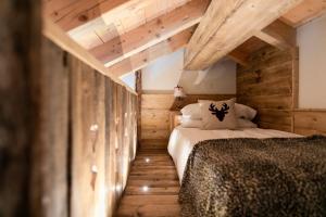 Postel nebo postele na pokoji v ubytování B&B Il Tabià