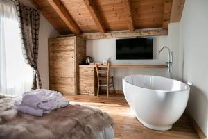 TV a/nebo společenská místnost v ubytování B&B Il Tabià