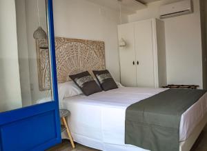 Posteľ alebo postele v izbe v ubytovaní Knysna Boutique Rooms