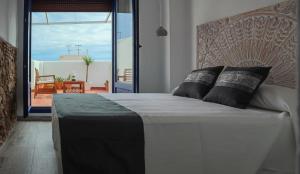 Posteľ alebo postele v izbe v ubytovaní Knysna Boutique Rooms