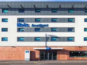 a building with a kids burger sign on it at ibis budget London Hounslow in Hounslow