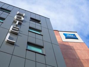 a building with a sign on the side of it at ibis budget London Hounslow in Hounslow