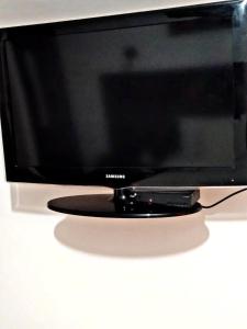 TV a/nebo společenská místnost v ubytování Hostal Mariscal Sucre