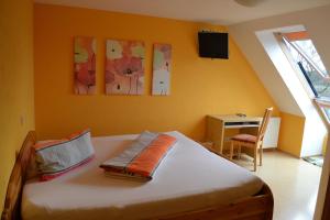 Postel nebo postele na pokoji v ubytování Gasthof Hotel Traube