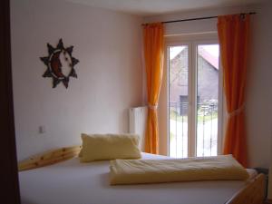 Postel nebo postele na pokoji v ubytování Gasthof Hotel Traube