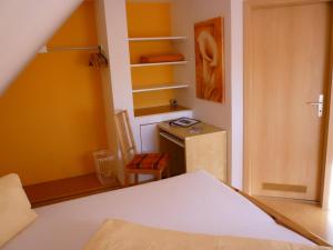 Postel nebo postele na pokoji v ubytování Gasthof Hotel Traube