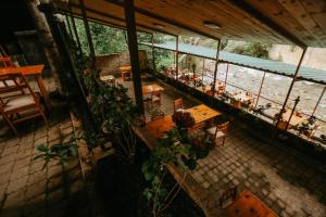 an overhead view of a restaurant with tables and chairs at SÜMELA HOLİDAY HOTEL in Macka
