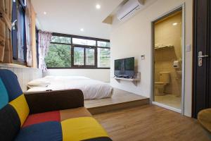 TV a/nebo společenská místnost v ubytování New Live B&B