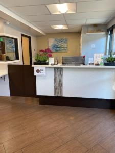 an office with a reception counter in a room at Convention Center Inn & Suites in San Jose