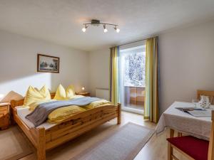 Postel nebo postele na pokoji v ubytování Haus Talblick