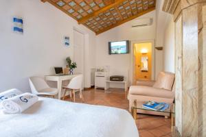 Łóżko lub łóżka w pokoju w obiekcie Suite Lidia B&B
