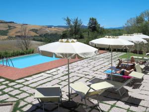 The swimming pool at or close to Apartment Villa Caggio-1 by Interhome