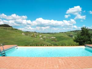 The swimming pool at or close to Apartment Villa Caggio-1 by Interhome