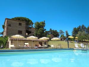 The swimming pool at or close to Apartment Villa Caggio-1 by Interhome