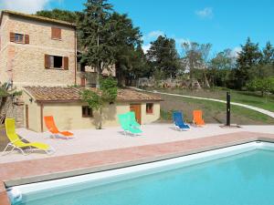 The swimming pool at or close to Apartment Villa Caggio-1 by Interhome