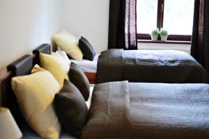 Posteľ alebo postele v izbe v ubytovaní Apartmán Lipno 50
