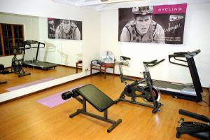 a gym with several exercise bikes in a room at Kronenhoff Guesthouse in Kirkwood