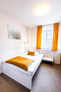 Postel nebo postele na pokoji v ubytování Hotel Olberg