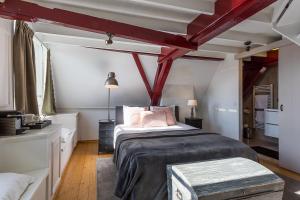 Postel nebo postele na pokoji v ubytování B&B Parijs aan de Kaai
