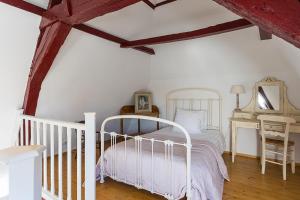 Postel nebo postele na pokoji v ubytování B&B Parijs aan de Kaai